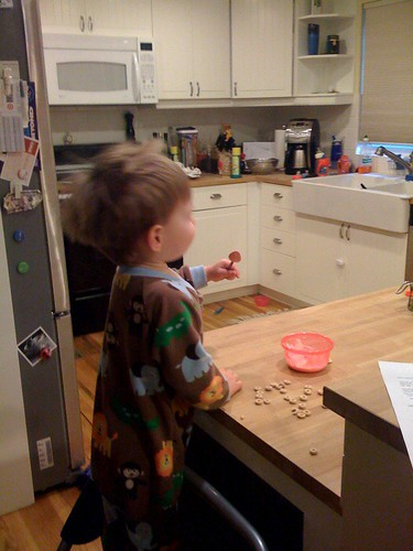 Eli up the stairs with Cheerios