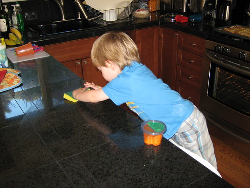 Eli wiping down the counter